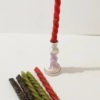 Wax candles, twisted with herbs, magic set, money candles,